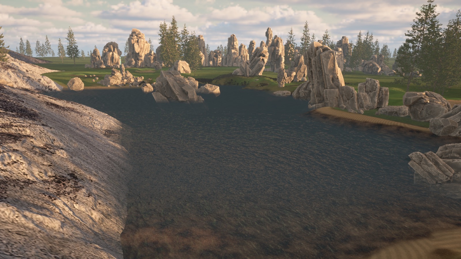 A dark lake cut into the course, ringed by pale stone spires and pines at low sun.